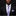 Man wearing a black suit with a purple paisley tie and pocket square on a dark background