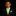 Young boy in a black suit with a green tie and pocket square on a black background