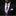 Man wearing a black suit with a colorful tie and white pocket square on a dark background