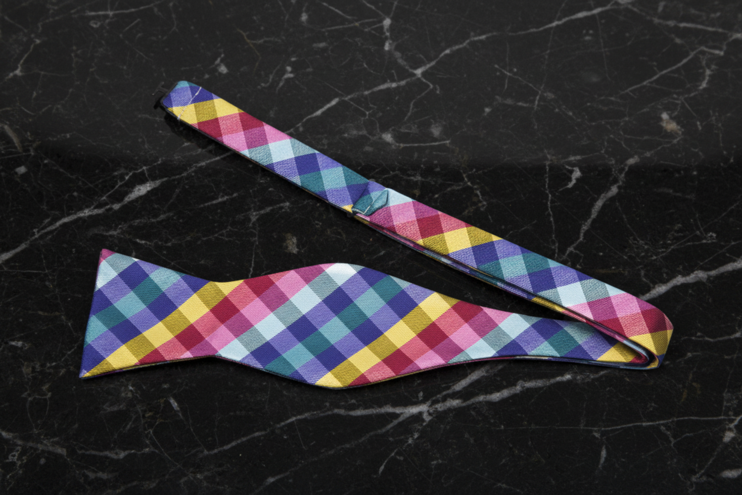 A Red, Blue, Yellow, Green Geometric Diamond Pattern Self Tie Bow Tie