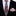 Floral patterned thin tie and accenting pocket square on a black suit jacket.
