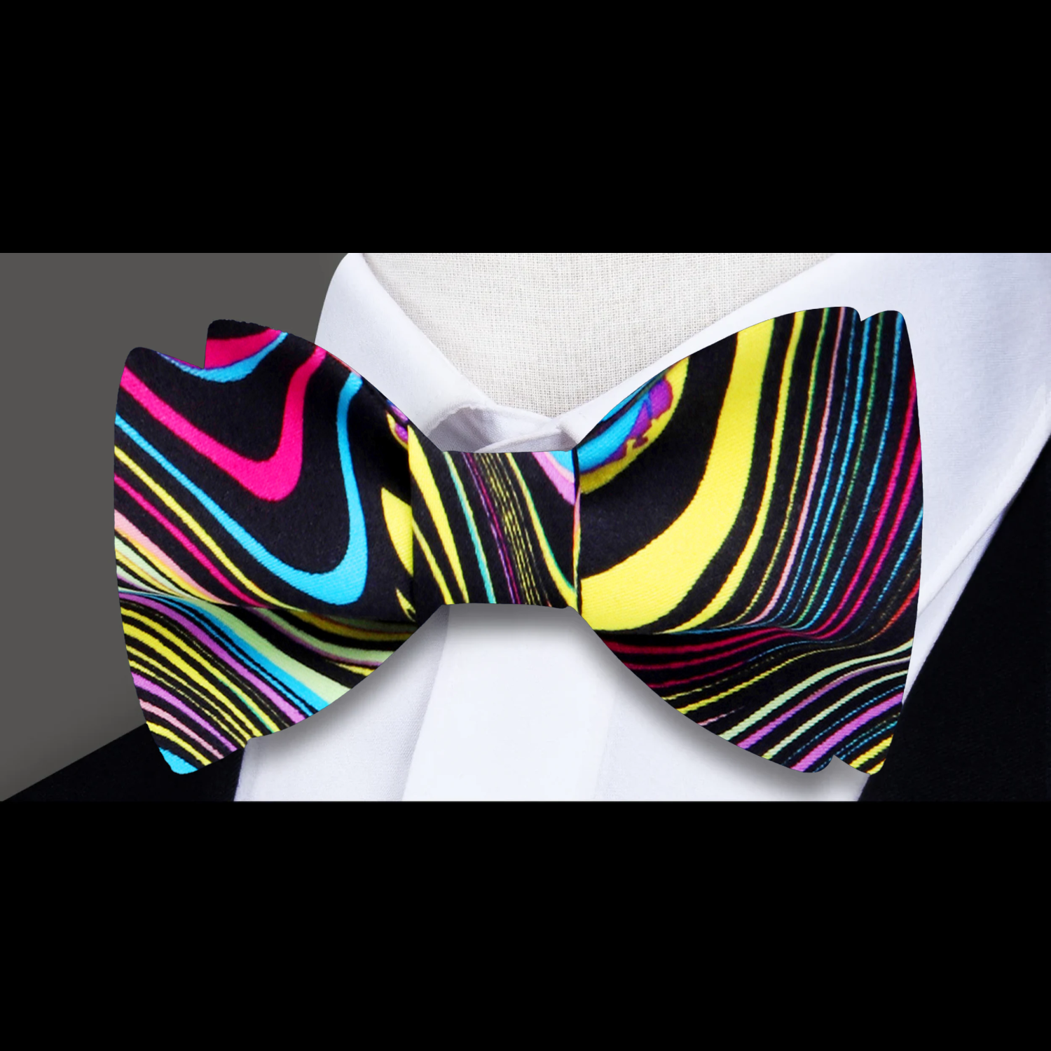 A Yellow, Pink, Blue, Black Abstract Swirl Pattern Self Tie Bow Tie