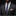 Man wearing a gray suit with a striped tie and pocket square on a black background