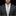 Man wearing a gray suit with a striped tie against a black background