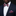 Man wearing a navy suit with a colorful bow tie and pocket square against a black background