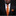 Man wearing orange and brown vines tie and square 
