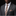 Man wearing a gray suit with a patterned tie and pocket square on a black background