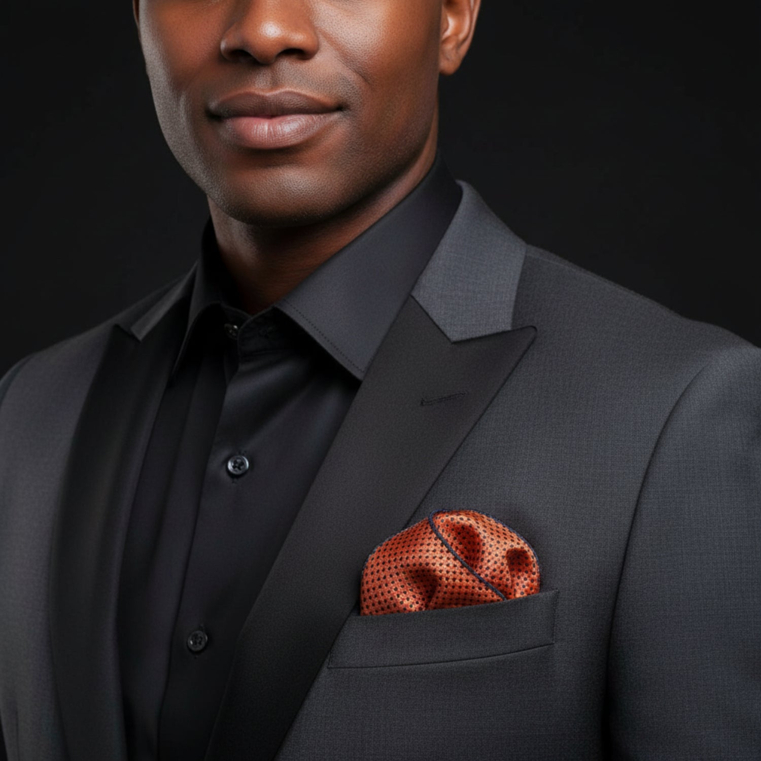 Man wearing orange handkerchief