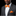 man wearing orange bow tie and square on suit