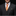 Man wearing a gray suit with a colorful tie and pocket square on a black background