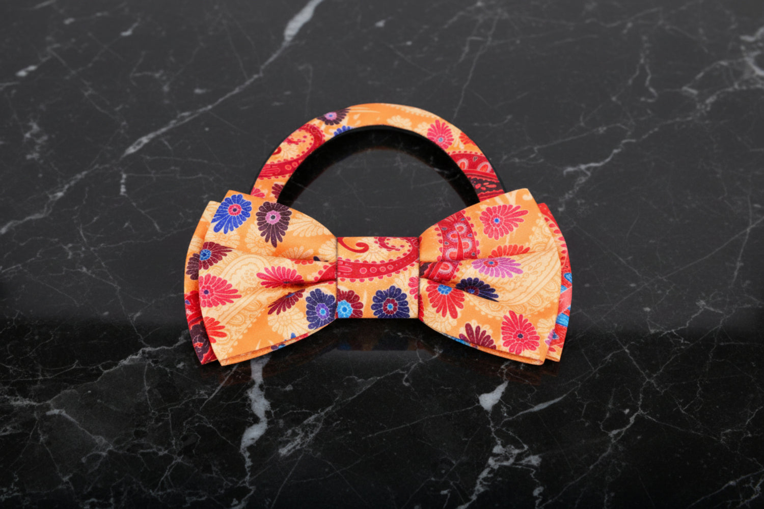 An Orange, Red, Blue, Purple, Pink Paisley Bow Tie Pre Tied