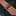 Tie Keep View: A Necktie that is sunfire coral with a small medallion pattern 