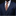 Man wearing a navy suit with a patterned tie and blue pocket square on a black background