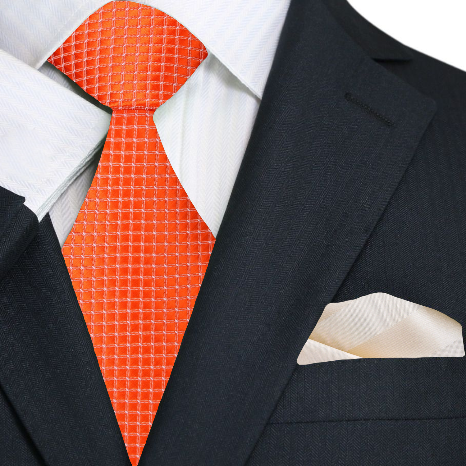 Black suit with white shirt, orange tie, and beige pocket square on a white background
