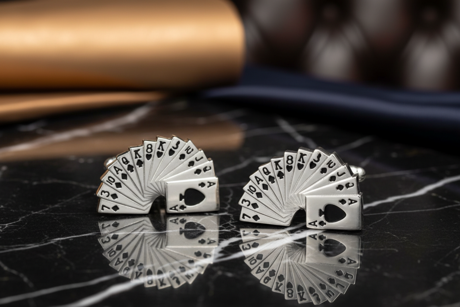 a small pair of playing cards cufflinks