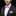 Man wearing a black suit with a pink striped bow tie and pocket square on a black background
