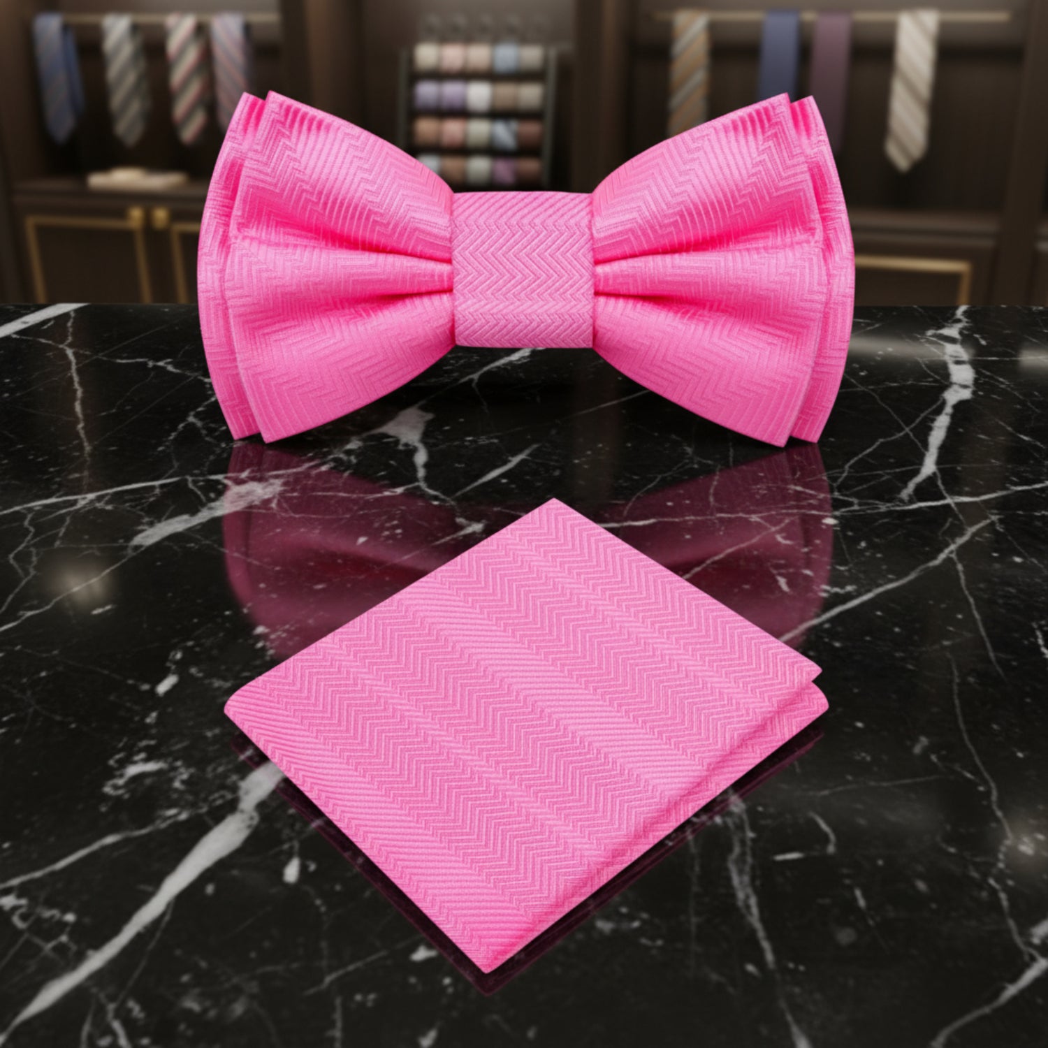 pink bow tie and square on black marble