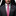 Man wearing a gray suit with a pink tie and colorful pocket square.
