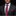 Man wearing a dark suit with a pink paisley tie and pocket square against a black background