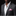 Man wearing a gray suit with a white shirt and pink checkered pocket square on a black background