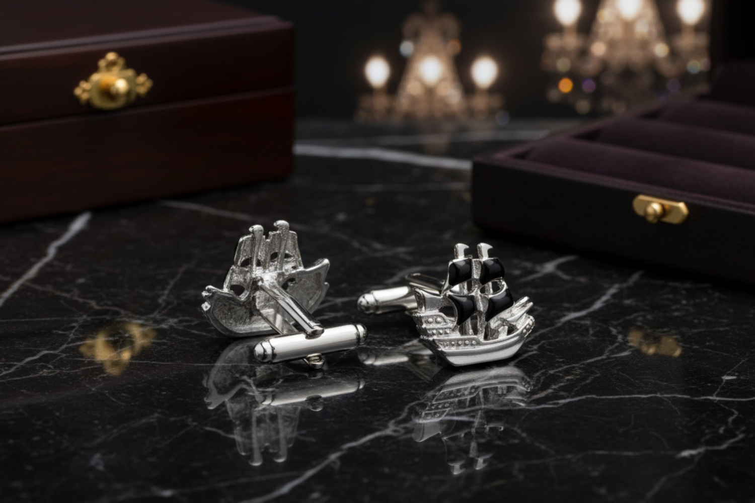 two cufflinks that are pirate ships