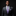 Man wearing a gray suit with a purple tie and pocket square on a black background