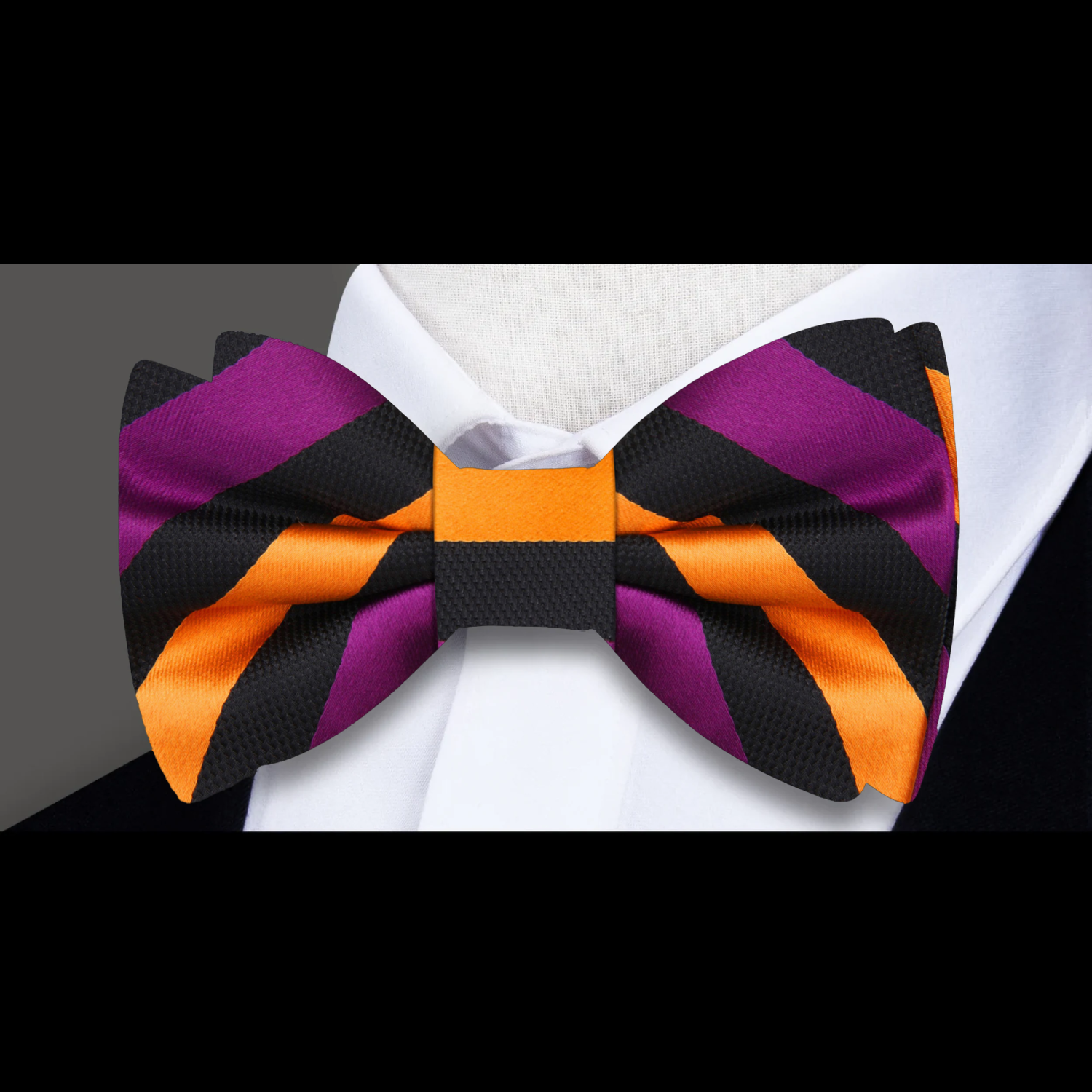 A Purple, Gold, Black Stripe Pattern Self Tie Bow Tie