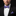 Purple checkered bow tie and pocket square set on man