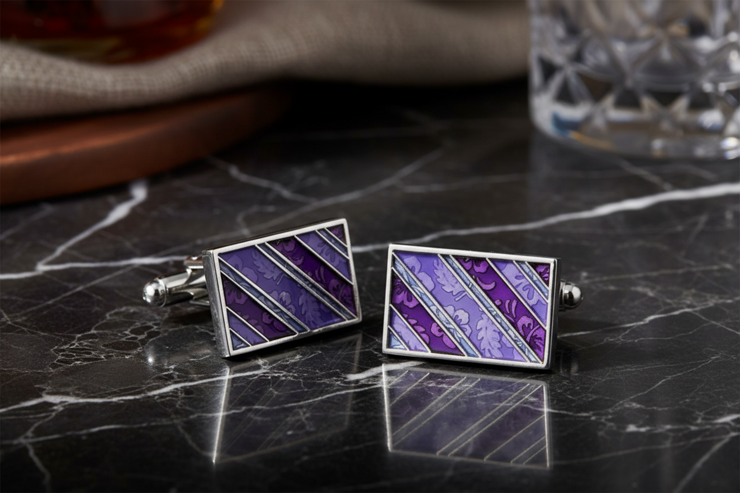A pair of rectangle purple cufflinks