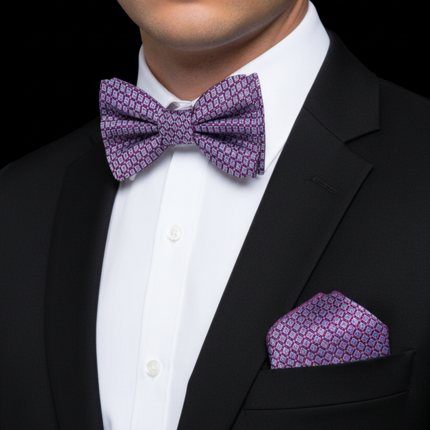 Man wearing a purple geometric bow tie and square