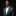 Man wearing purple gold geometric bow tie and accenting square on suit