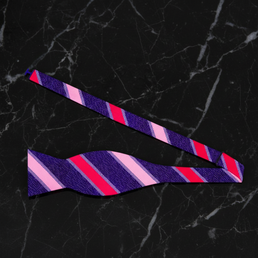 Striped bow tie with purple, pink, and red pattern self tie