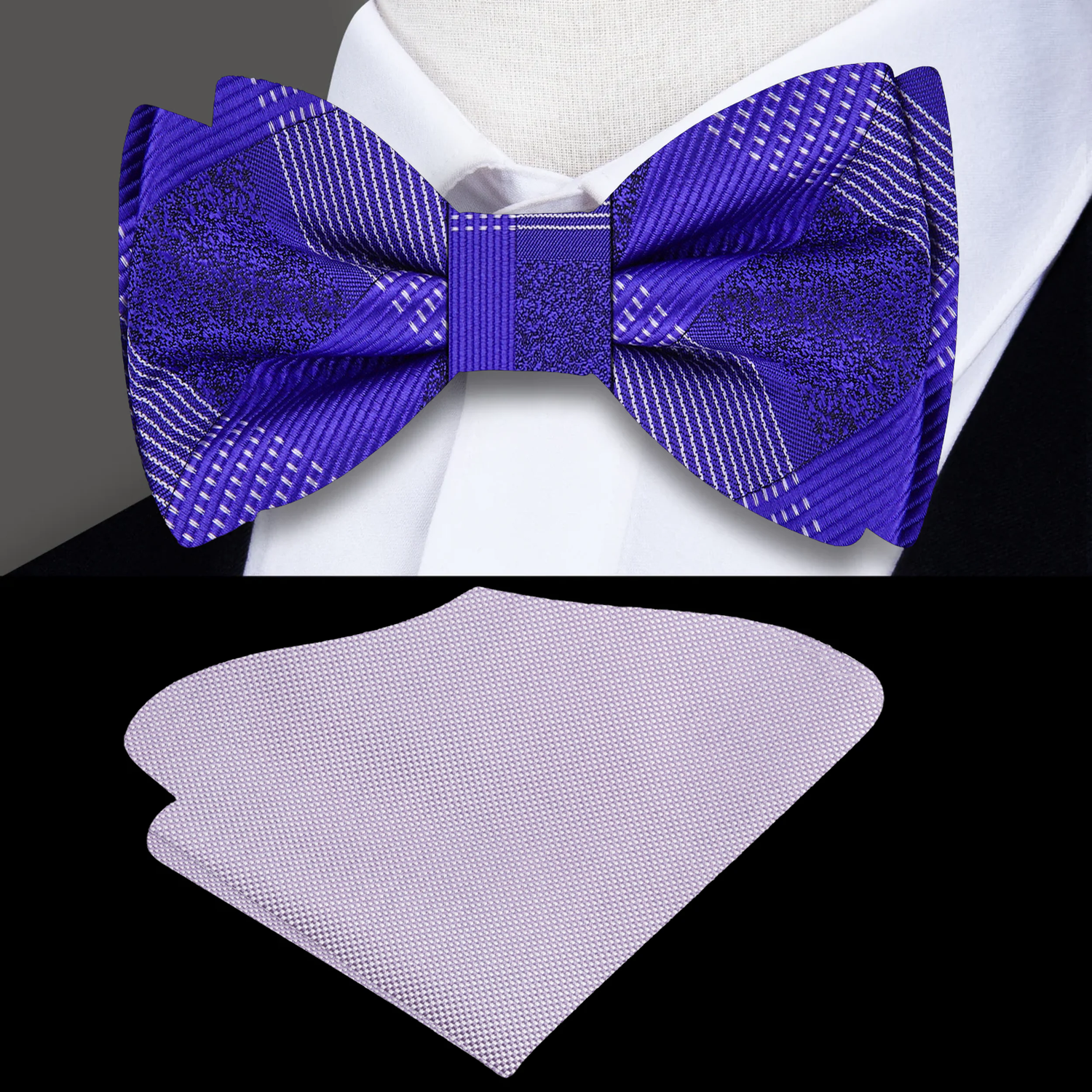 Purple bow tie and grey pocket square on a mannequin with a white shirt.