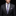 Man wearing a dark suit with a plaid purple tie and pocket square on a black background