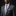 Man wearing a gray suit with a Black, Purple and Yellow Snakeskin Tie and pocket square on a black background