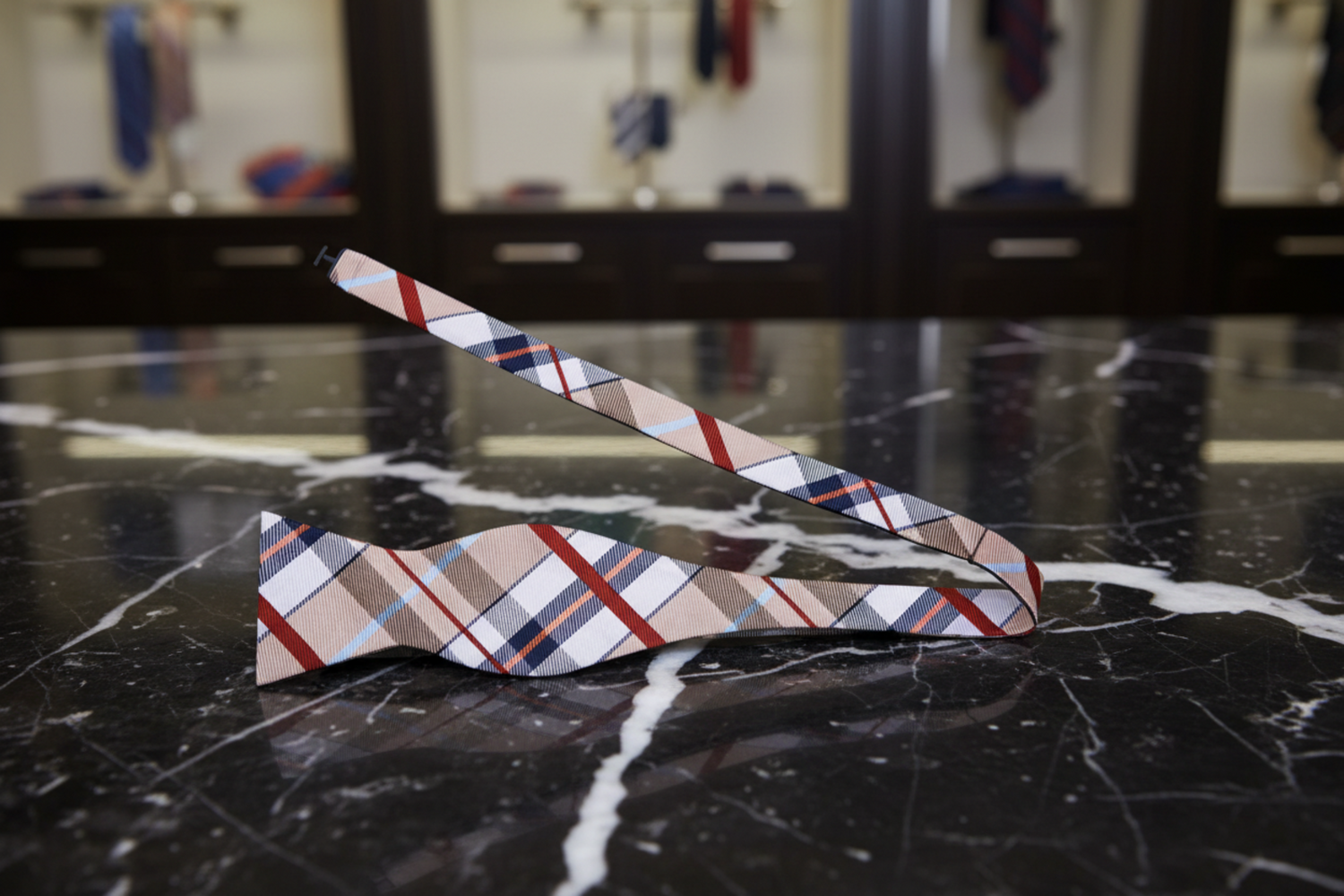 A Cream, White, Blue, Red Plaid Pattern Self Tie Bow Tie view 2
