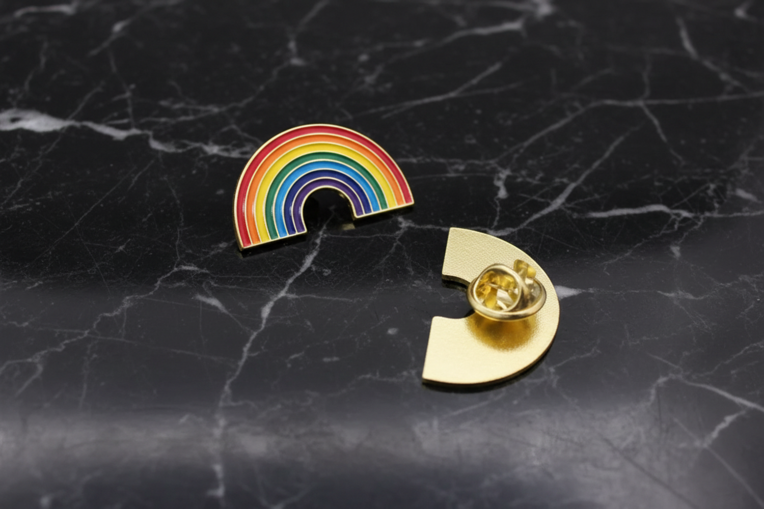 a small lapel pin rainbow