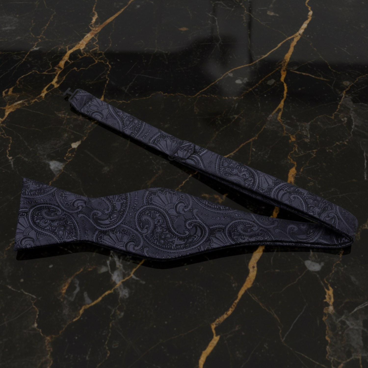 A Black, Graphite Paisley Pattern Self Tie Bow Tie