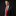 Man wearing a black suit with a red tie and pocket square on a dark background