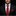 Man wearing a black suit with a red tie and pocket square on a dark background
