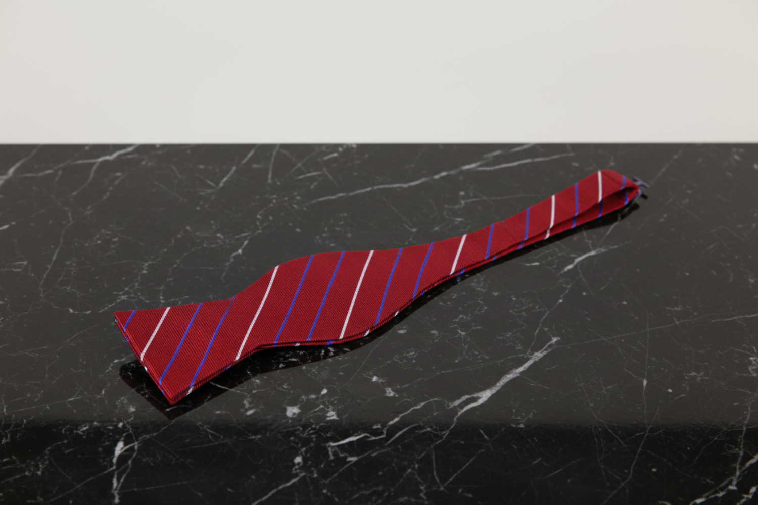 A Red, White Blue Stripes Pattern Self Tie Bow Tie Self Tie