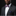Man wearing a dark suit with a red and blue checkered bow tie and matching pocket square on a black background