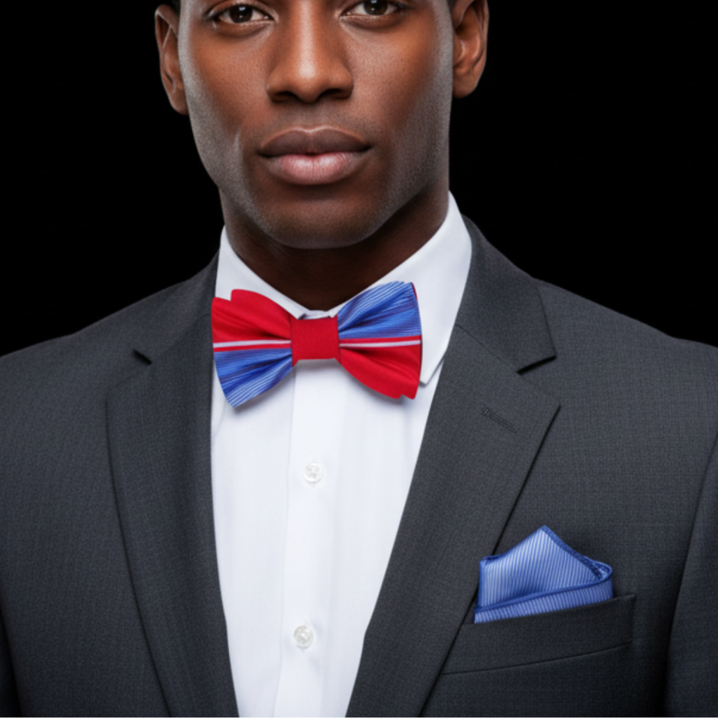 Man wearing blue and red bow tie and square