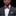 Man wearing blue and red bow tie and square