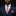 Man wearing a navy suit with a red paisley tie and pocket square on a black background