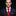 Man wearing a dark suit with a red tie against a black background