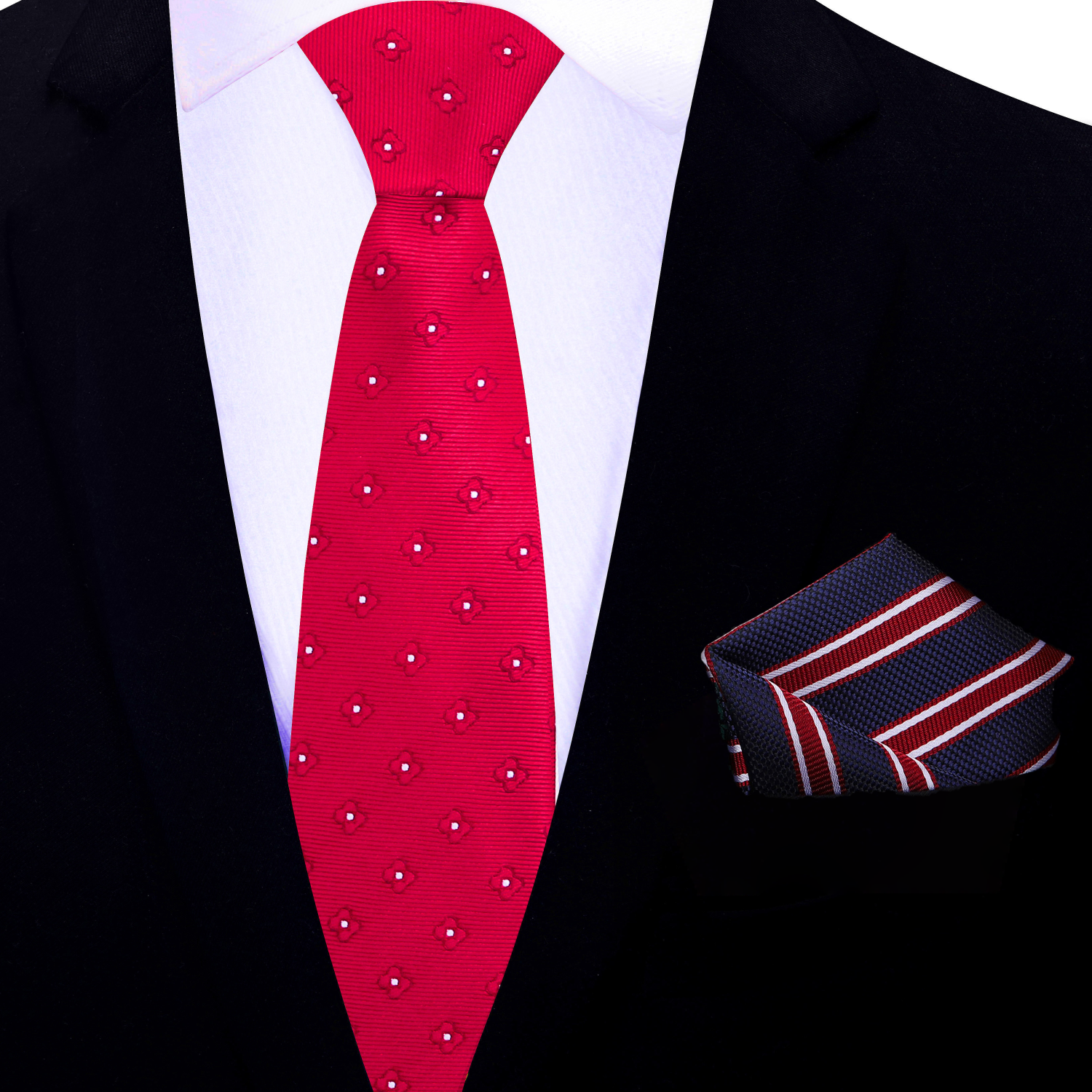 Red patterned tie and matching pocket square on a black suit jacket.