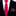 Red patterned tie and matching pocket square on a black suit jacket.