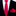 Red tie with white polka dots and matching pocket square on a black suit.