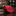 Red tie with a subtle pattern on a dark marble surface